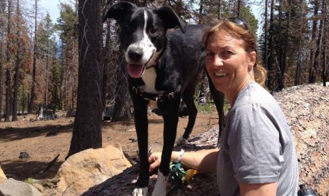 Coach Lauren Anderson enjoys time outside with loyal companion.